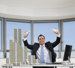Pacific Islander businessman sitting with stacks of money