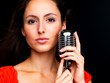 Attractive female singer with a retro microphone