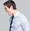 Frustrated young male entrepreneur shouting