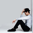 Handsome young man in thoughtful mood