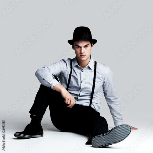 Photo: Relaxed young man posing confidently - Copyspace Relaxed young man posing confidently - Copyspace
