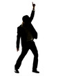 Silhouette image of a young male superstar dancing