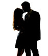 An attractive couple sharing a passionate kiss
