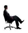 Young business man relaxing in chair