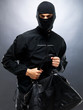Criminal theme - Male thief stealing a handbag