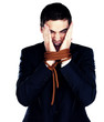 Restriction - Busienwssman being tied with rope shouting