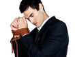 Concept for powerless  - Upset business man being tied up with r