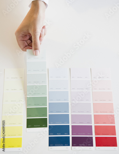 Photo: Hand selecting color swatch Hand selecting color swatch