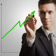 young businessman, drawing chart