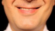 Businessmans mouth talking, extreme close-up