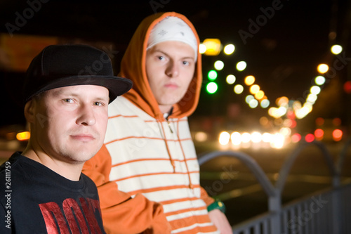 Photo: Rapper guys on the street at night Rapper guys on the street at night