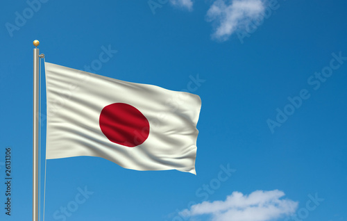Photo: Flag of Japan waving in the wind in front of blue sky Flag of Japan waving in the wind in front of blue sky