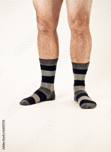 Photo: Bare man legs with socks Bare man legs with socks