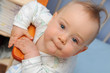 Happy infant in bed