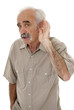 Man cupping his ear having difficulty hearing