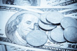 coins on dollars background
