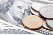 coins on dollars background