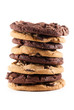 Stack of mixed cookies against an isolated background