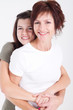 happy mother and daughter hugging