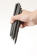 many black pens in hand many black pens in hand
