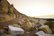 Beautiful view of beach at sunrise with rock details