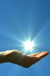 hand sun and blue sky