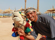 Bedouin smile portrait with camel