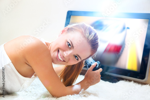 Photo: Young woman playing Young woman playing