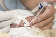 Newborn and hand