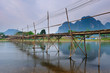 Bridge to riverside guesthouse, Vang vieng, Laos