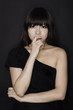 Asian girl in black clubbing dress