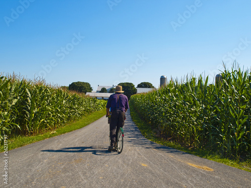 Photo: Amish Farmer riding a bicycle Amish Farmer riding a bicycle