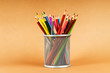 Many colorful pencils on the color background