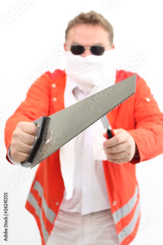 Photo: Horrordoktor mit einer Säge Horrordoktor mit einer Säge