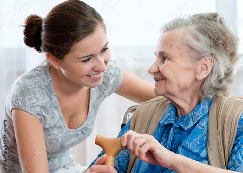 Foto: Senior woman with her home caregiver Senior woman with her home caregiver
