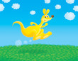 Funny yellow kangaroo jumps in a field