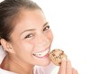 Woman eating cookie