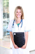 Photo: blond medical doctor woman with stethoscope blond medical doctor woman with stethoscope
