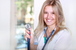 Photo: Portrait of happy successful young female doctor Portrait of happy successful young female doctor