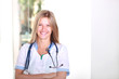 Photo: A pretty young woman nurse smiling in hospital A pretty young woman nurse smiling in hospital