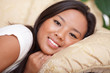 Portrait of a Beautiful asian woman relaxing on a coach