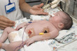 Newborn and hand