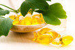 ginko biloba essential oil with fresh leaves - beauty treatment