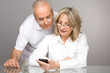 Pensioners with a phone