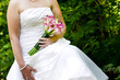 Photo: Bride showing off her wedding bouquet Bride showing off her wedding bouquet