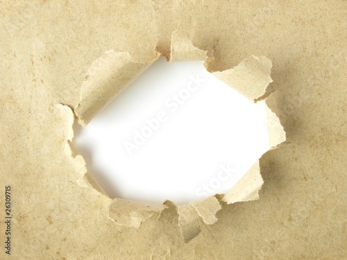 Photo: Agujero blanco sobre papel antiguo Agujero blanco sobre papel antiguo