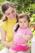 Baby girl with phone receiver