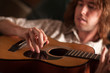 Young Musician Plays His Acoustic Guitar Young Musician Plays His Acoustic Guitar