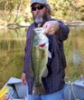 fisherman with bass