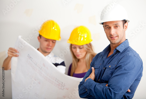 Photo: Architects at a construction site Architects at a construction site